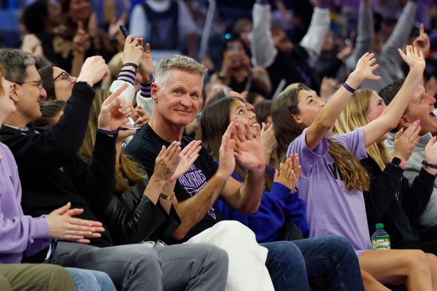 The Golden State Warriors' head coach Steve Kerr waves at fans during the fourth quarter of a WNBA game between the Golden State Valkyries and the Los Angeles Sparks at the Chase Center in San Francisco, Calif., on Friday, May 16, 2025. (Shae Hammond/Bay Area News Group)