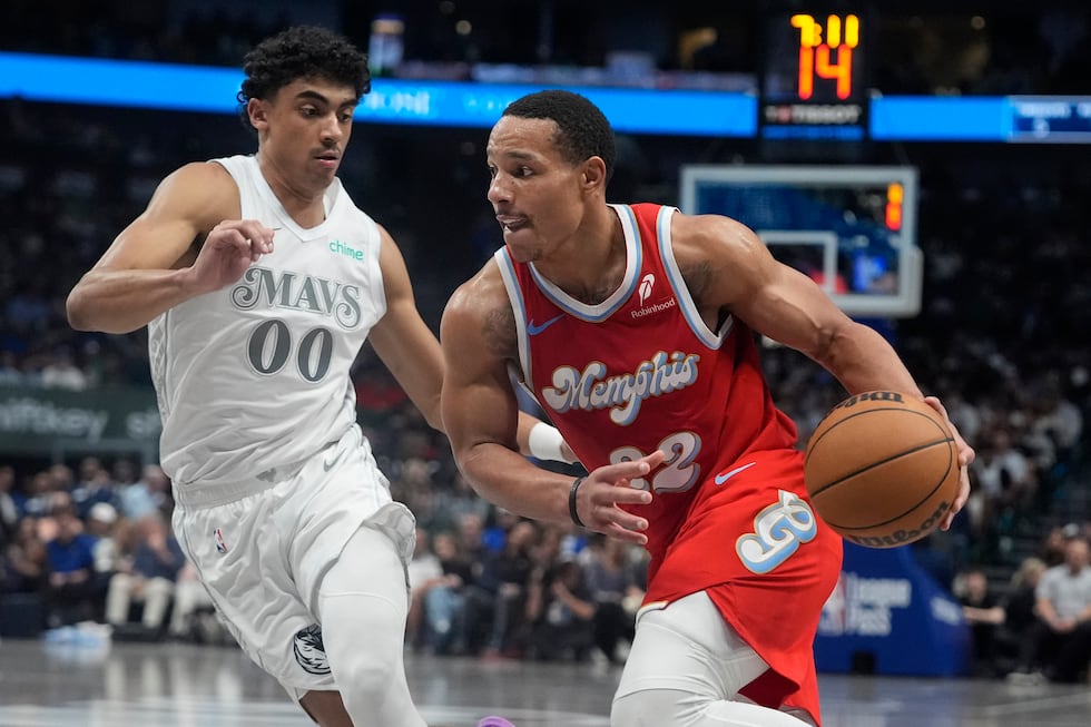 Memphis Grizzlies guard Desmond Bane (22) drives against Dallas Mavericks guard Max Christie...