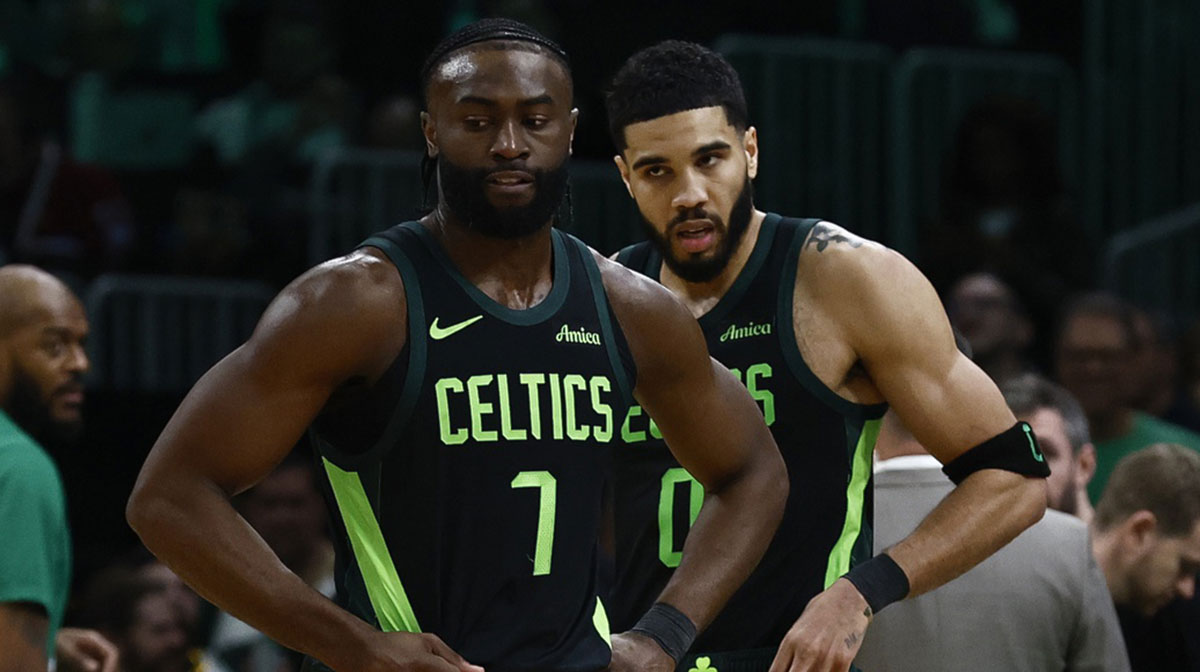 Boston Celtics guard Jaylen Brown (7) and forward Jayson Tatum (0) stand on the court during a timeout during the second half of their loss to the Cleveland Cavaliers at TD Garden.