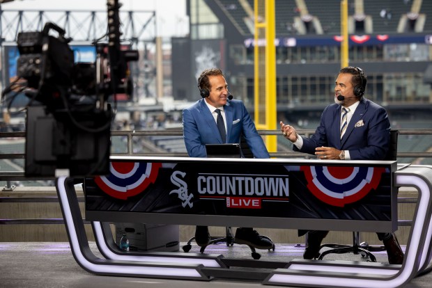 Chicago Sports Network hosts Chuck Garfien and Ozzie Guillén broadcast from their new studio in left field on March 27, 2025, on opening day at Rate Field. (Brian Cassella/Chicago Tribune)