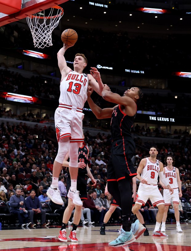 Bulls guard Kevin Huerter dunks in the second half against the Raptors on Tuesday, April 1, 2025, at the United Center. (Chris Sweda/Chicago Tribune)