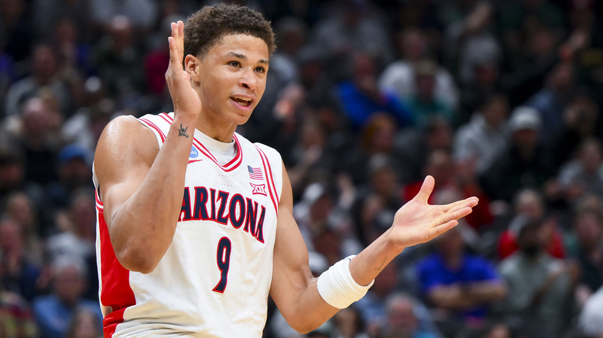 Arizona Wildcats forward Carter Bryant (9) reacts against the Oregon Ducks in the first half at Climate Pledge Arena.