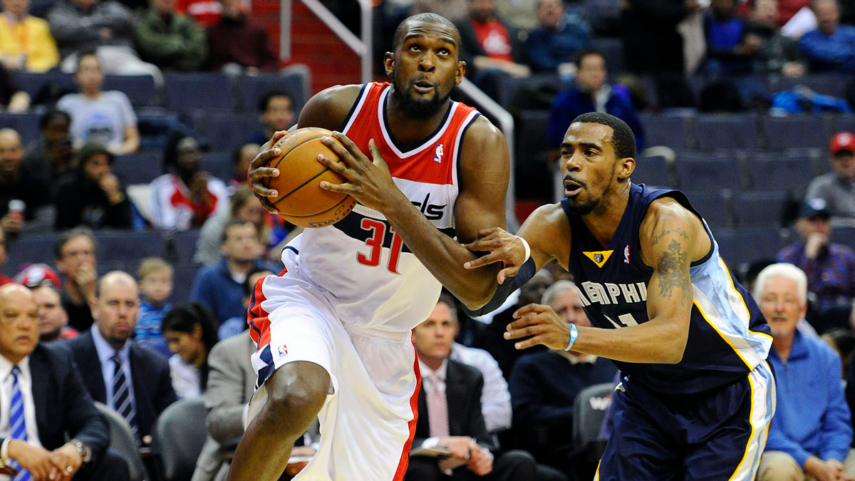 Washington Wizards small forward Chris Singleton (31) drives past Memphis Grizzlies point guard Mike Conley (11) during the first half at Verizon Center. 