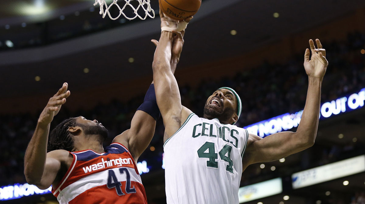Boston Celtics power forward Chris Wilcox (44) works for the rebound against Washington Wizards center Nene (42) during the second half at the TD Garden. The Celtics defeated the Washington Wizards 107-96.