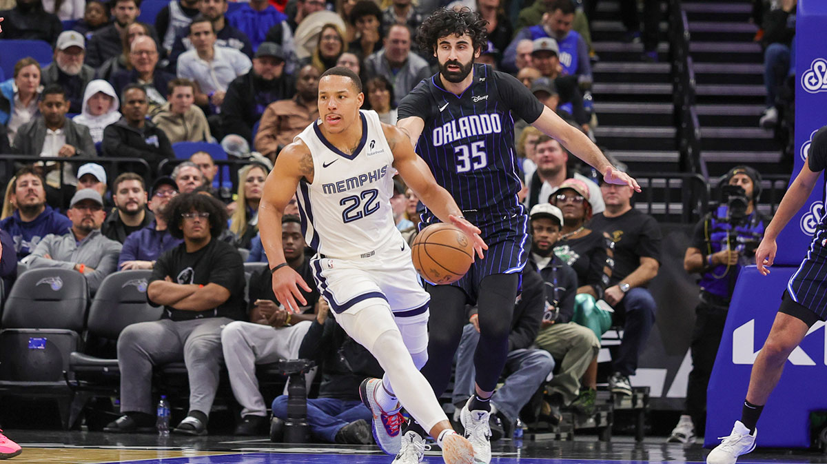 Memphis Grizzlies guard Desmond Bane (22) moves the ball in front of Orlando Magic center Goga Bitadze (35) during the second quarter at Kia Center.