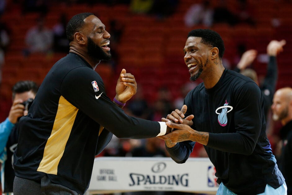 LeBron James #23 of the Los Angeles Lakers jokes with Udonis Haslem #40 of the Miami Heat prior to the game at American Airlines Arena on December 13, 2019