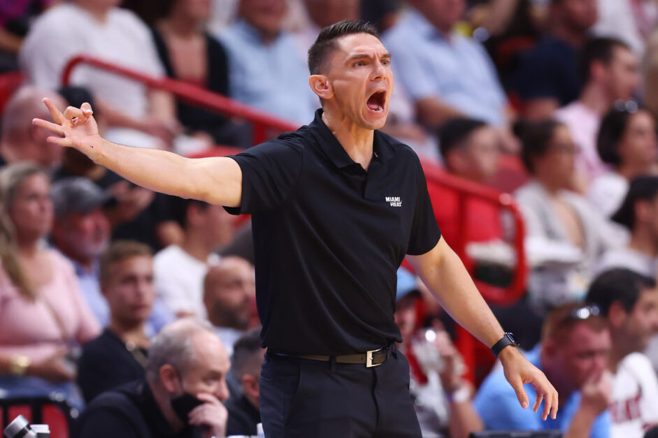 Miami Heat associate head coach Chris Quinn yells during a game against the Charlotte Hornets.