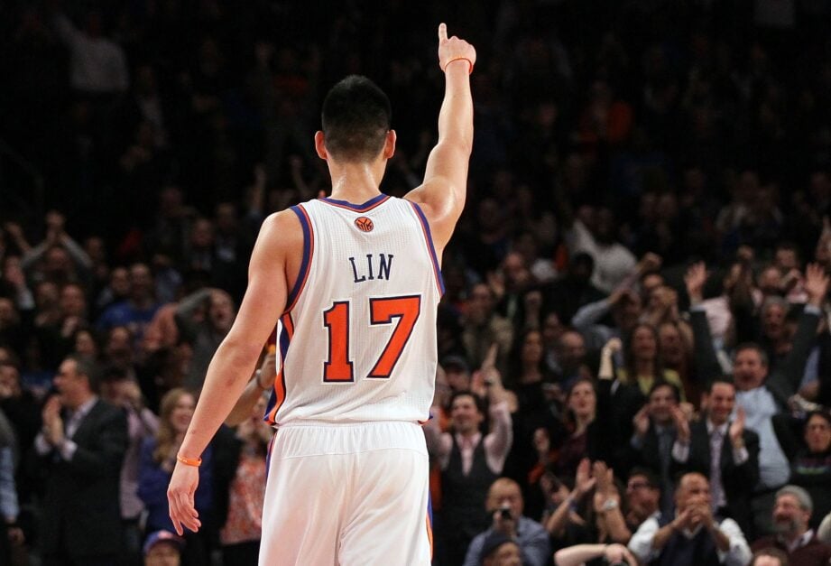 Former NBA star Jeremy Lin celebrates by point his finger to the sky during his Linsanity Run with the New York Knicks.