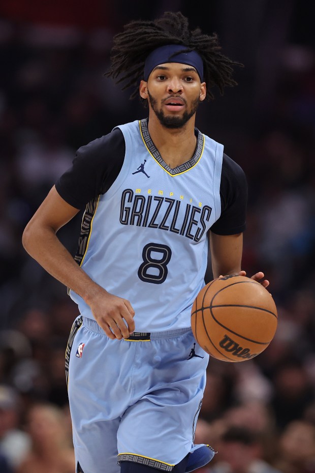 Ziaire Williams #8 of the Memphis Grizzlies dribbles upcourt during the first half of a game against the LA Clippers at Crypto.com Arena on December 29, 2023 in Los Angeles.