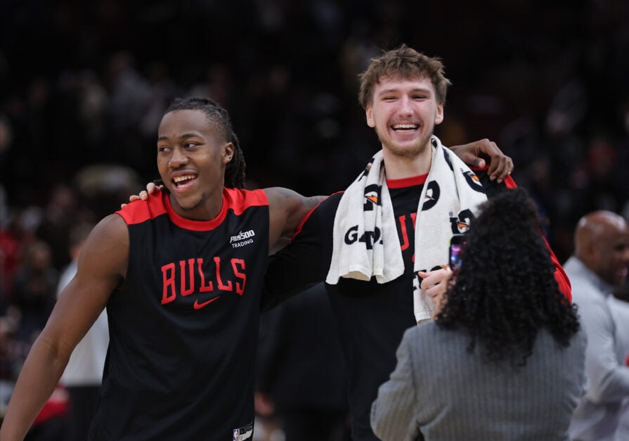 Ayo Dosunmu and Matas Buzelis on the Chicago Bulls sidelines