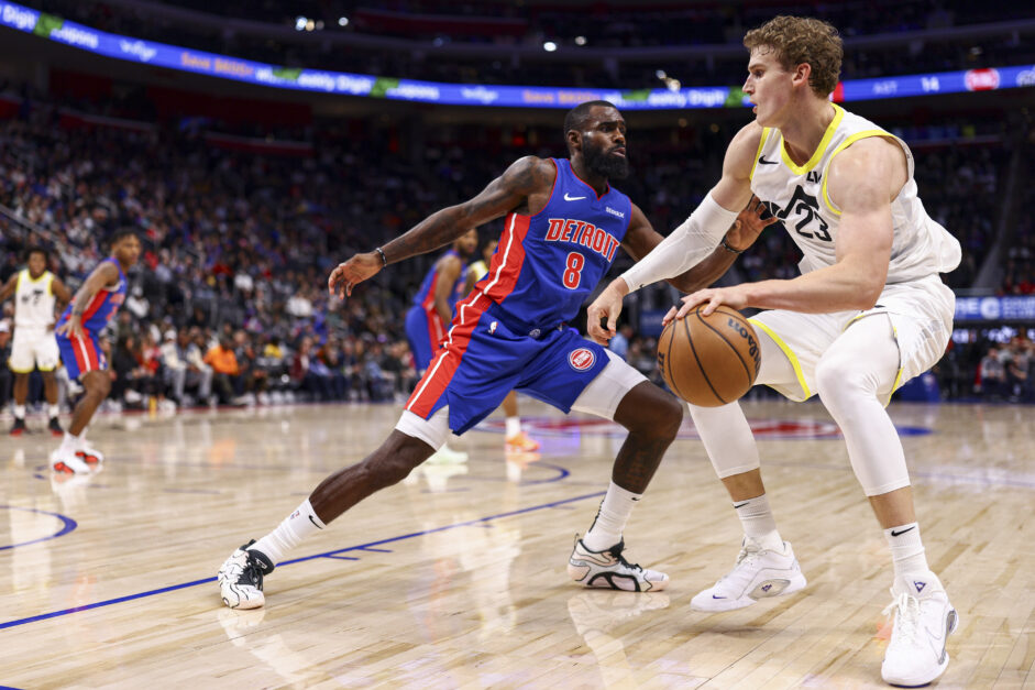 Utah Jazz forward Lauri Markkanen dribbles against Detroit Pistons forward Tim Hardaway Jr.