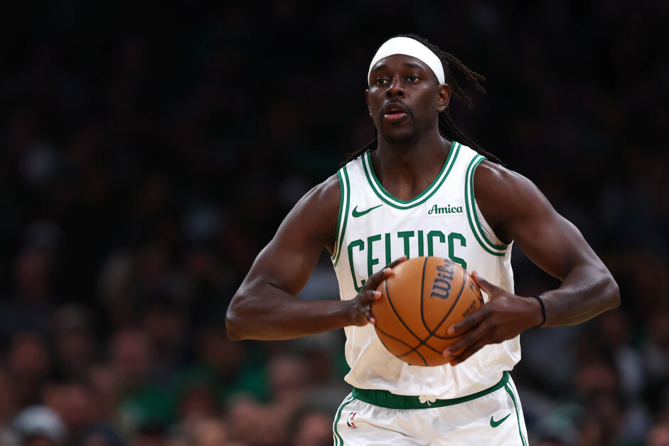 #4 of the Boston Celtics Jrue Holiday holding basketball in his hands during a game against the Chicago Bulls.