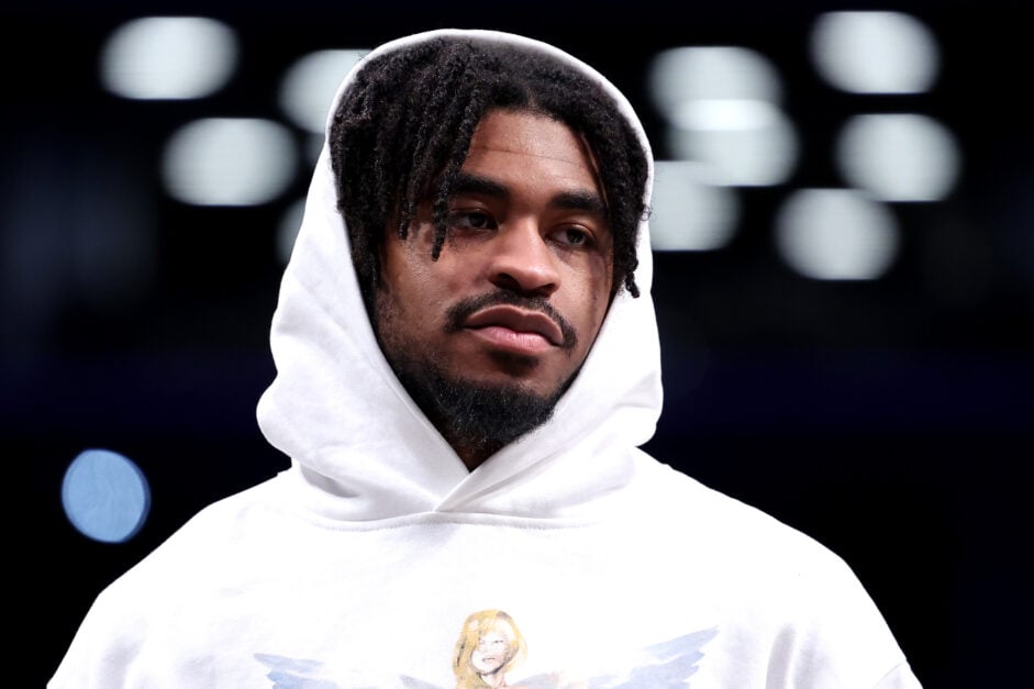 Cam Thomas watches the Nets' game against the Pacers from the sidelines.