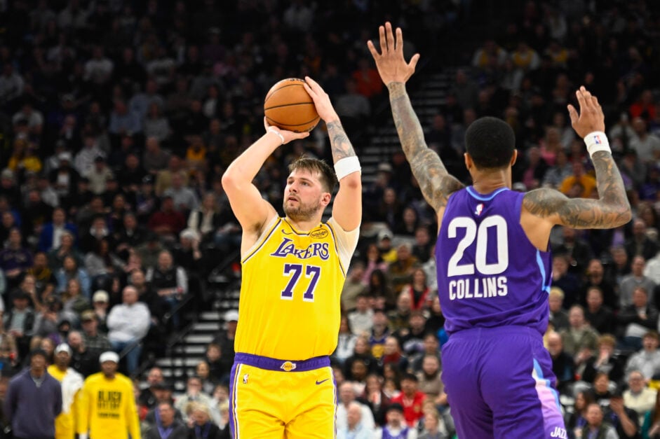 Los Angeles Lakers guard Luka Doncic shoots over John Collins