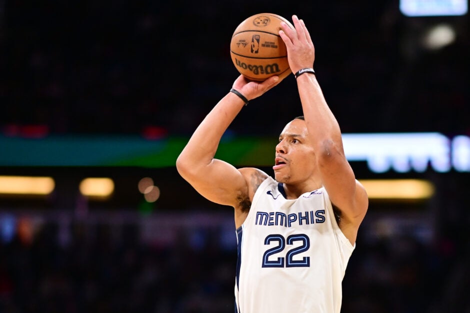 Desmond Bane #22 of the Memphis Grizzlies shoots a three-point-basket in the second half of a game against the Orlando Magic