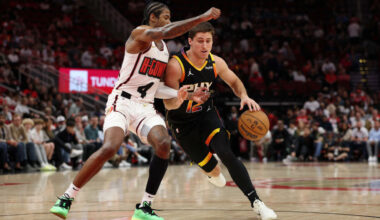 Collin Gillespie #12 of the Phoenix Suns drives against Jalen Green #4 of the Houston Rockets durin...