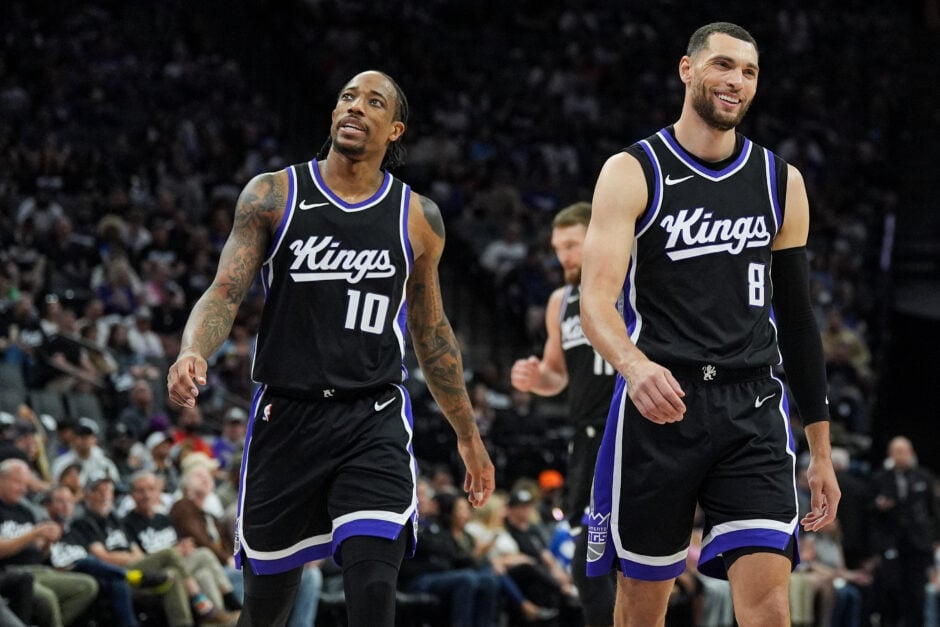 Zach Lavine #8 and DeMar DeRozan #10 of the Sacramento Kings smile between plays against the Phoenix Suns