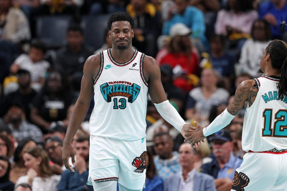 Memphis Grizzlies' Jaren Jackson Jr. claps teammate Ja Morant's hand during NBA Play-In Tournament.