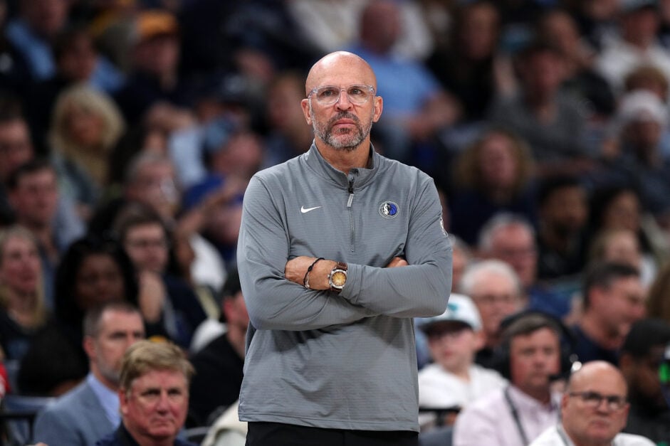 Dallas Mavericks head coach Jason Kidd stands with his hands folded during the NBA Play-In Tournament.