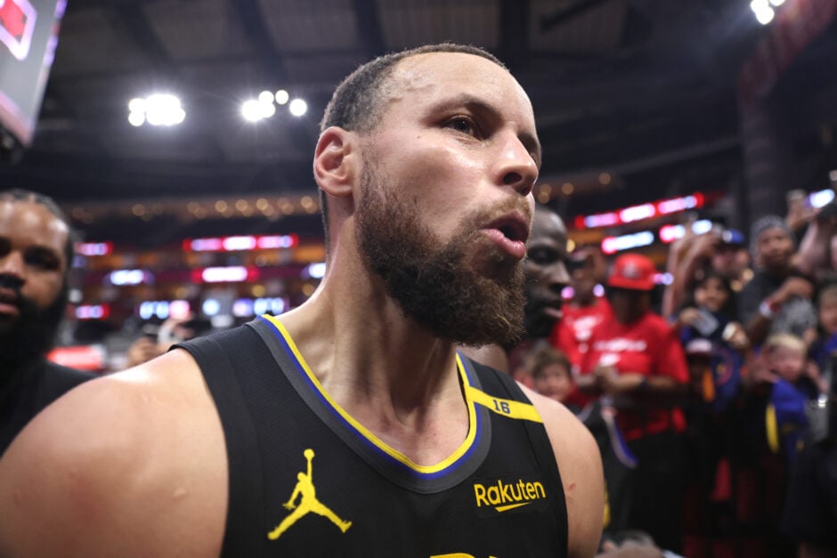 Stephen Curry reacts during the Golden State Warriors' Game 7 win over the Houston Rockets in 2025 NBA Playoffs.