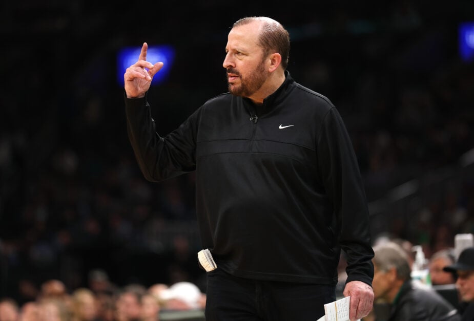Tom Thibodeau on coaching sidelines, finger points in the air