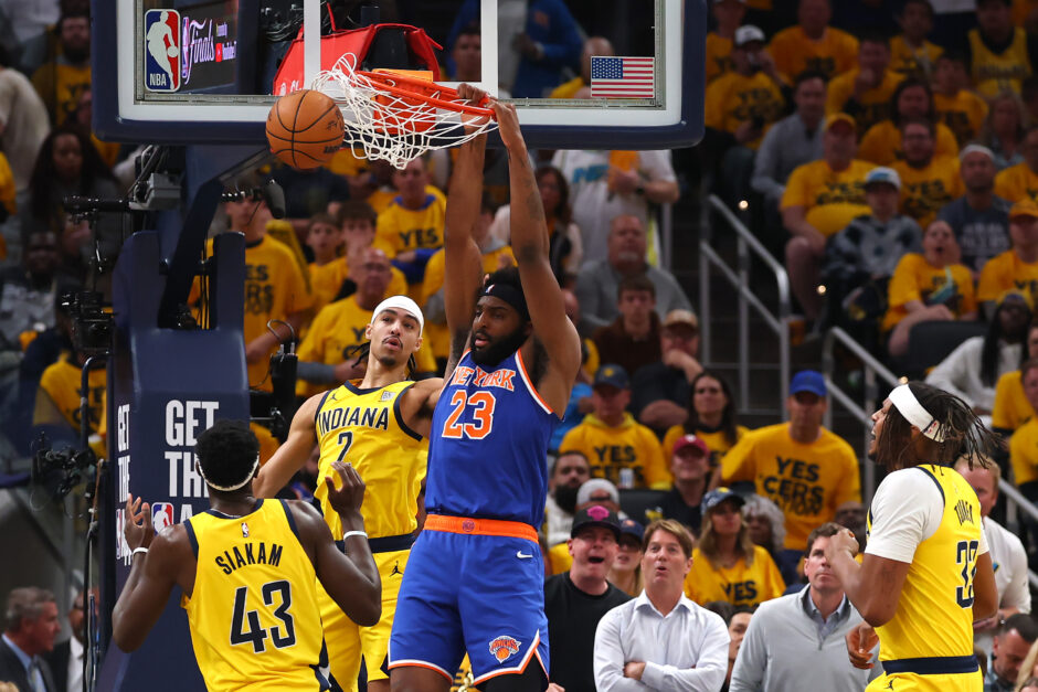 Mitchell Robinson makes a dunk