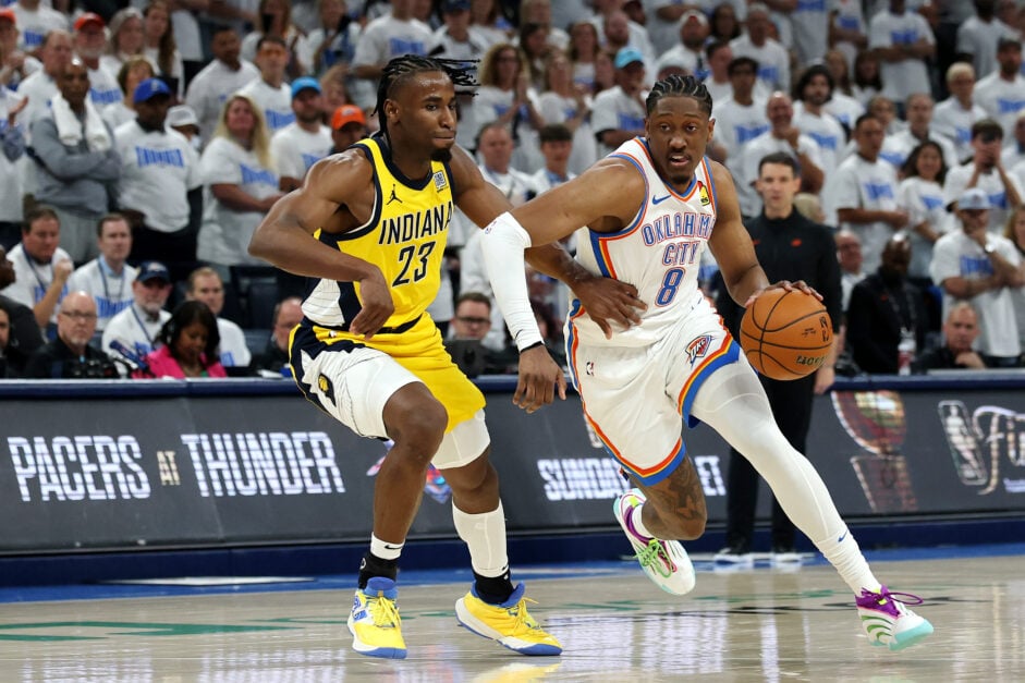 Jalen Williams of the OKC Thunder drives the ball against Aaron Nesmith of the Indiana Pacers