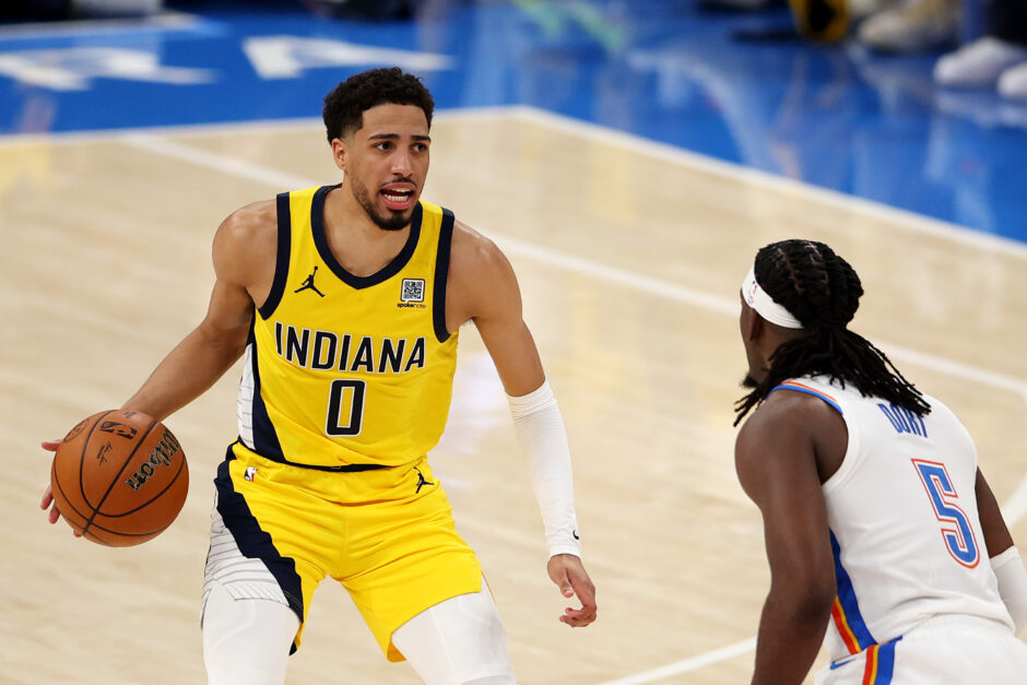 Tyrese Haliburton playing against OKC Thunder player Lu Dort in the NBA Finals.