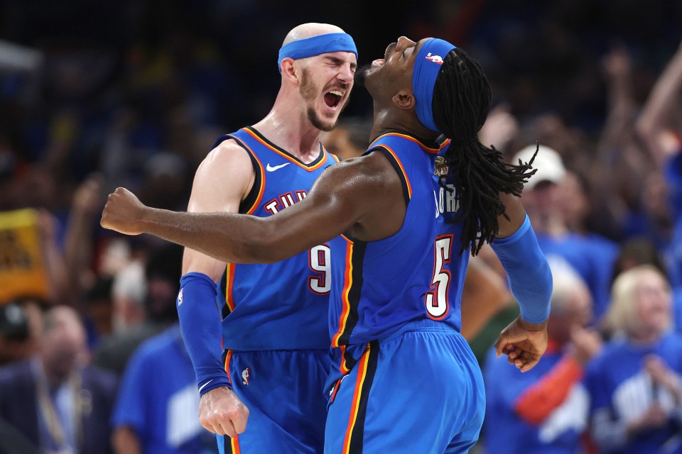 OKLAHOMA CITY, OKLAHOMA - JUNE 22: Alex Caruso #9 and Luguentz Dort #5 of the Oklahoma City Thunder celebrate during the fourth quarter against the Indiana Pacers in Game Seven of the 2025 NBA Finals at Paycom Center on June 22, 2025 in Oklahoma City, Oklahoma. NOTE TO USER: User expressly acknowledges and agrees that, by downloading and or using this photograph, User is consenting to the terms and conditions of the Getty Images License Agreement. (Photo by Matthew Stockman/Getty Images)