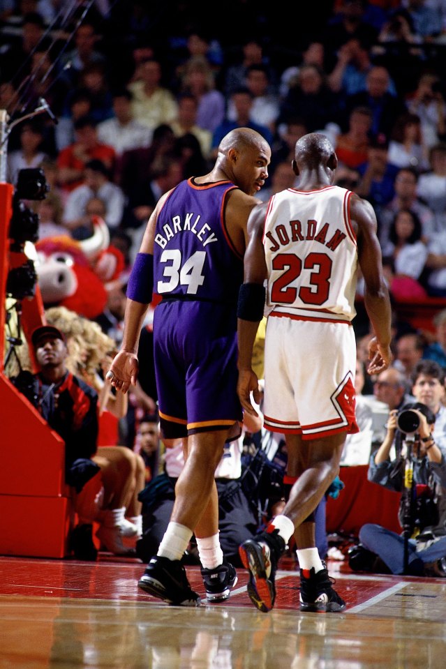 CHICAGO - JUNE 18:  Charles Barkley #34 of the Phoenix Suns chats with Michael Jordan #23 of the Chicago Bulls in Game Five of the 1993 NBA Finals on June 18, 1993 at the Chicago Stadium in Chicago, Illinois. The Suns won 108-98. NOTE TO USER: User expressly acknowledges and agrees that, by downloading and/or using this Photograph, user is consenting to the terms and conditions of the Getty Images License Agreement. Mandatory Copyright Notice: Copyright 1993 NBAE  (Photo by Nathaniel S. Butler/NBAE via Getty Images)