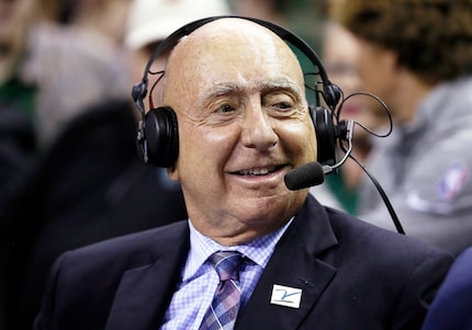 FILE - ABC/ESPN basketball analyst Dick Vitale sits at midcourt prior to an NCAA college...