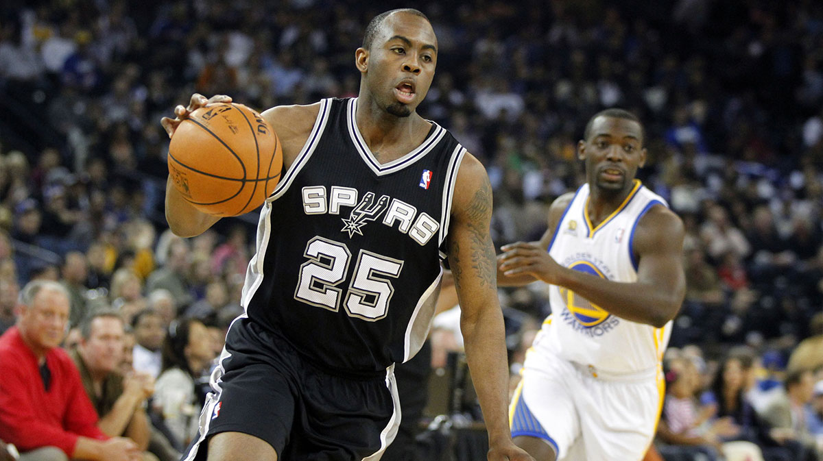 San Antonio Spurs guard James Anderson (25) dribbles the ball against the Golden State Warriors in the first quarter at ORACLE Arena. 