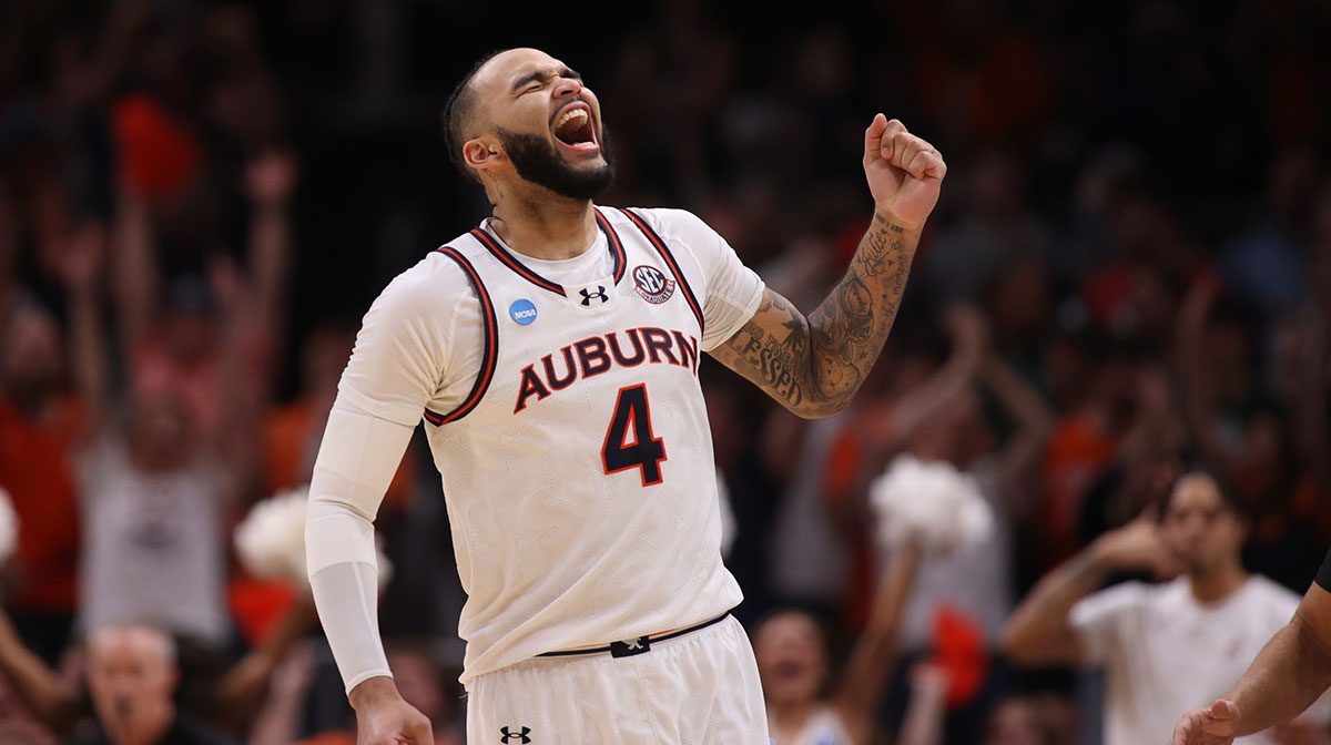 Mar 30, 2025; Atlanta, GA, USA; Auburn Tigers forward Johni Broome (4) celebrates after a play during the second half in the South Regional final of the 2025 NCAA tournament against the Michigan State Spartans at State Farm Arena.