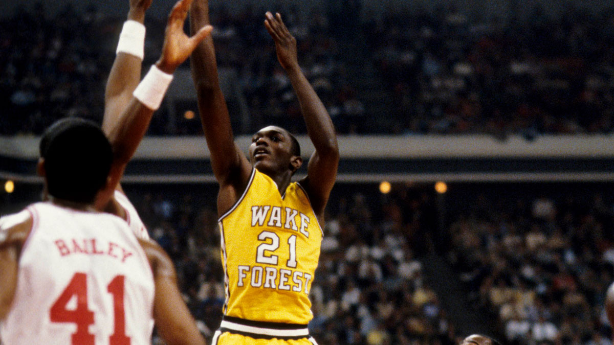 Wake Forest Demon Deacons guard Kenny Green (21) in action against the North Carolina State Wolfpack during the 1983 ACC Tournament at the Omni. 