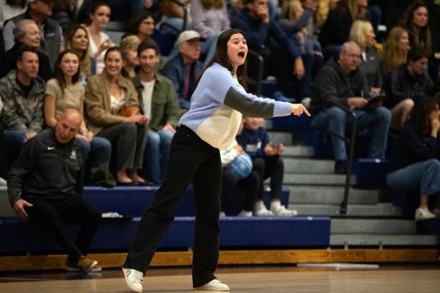 Marin Catholic head coach Kayden Korst shouts instructions to her...