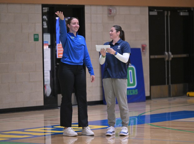 San Domenico girls assistant basketball coach Shasta Shasta Parker, left,...