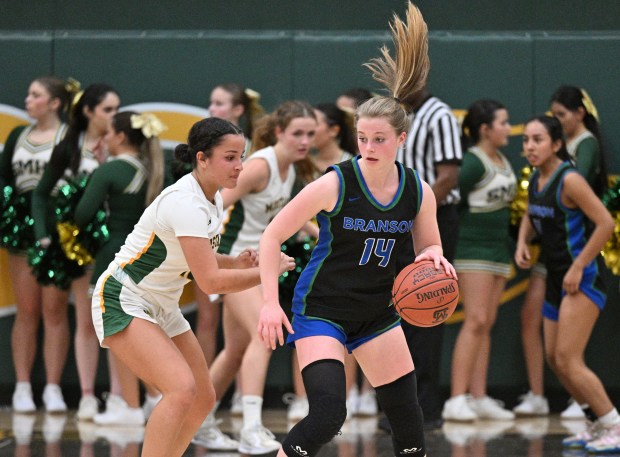 San Marin’s Abigail Bartholo, left, guards Avery Myerberg of Branson...