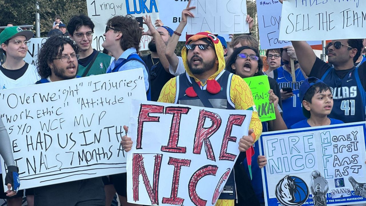 Dallas Mavericks fans protest the Luka Doncic trade. (Spectrum News 1/Michael Lozano)