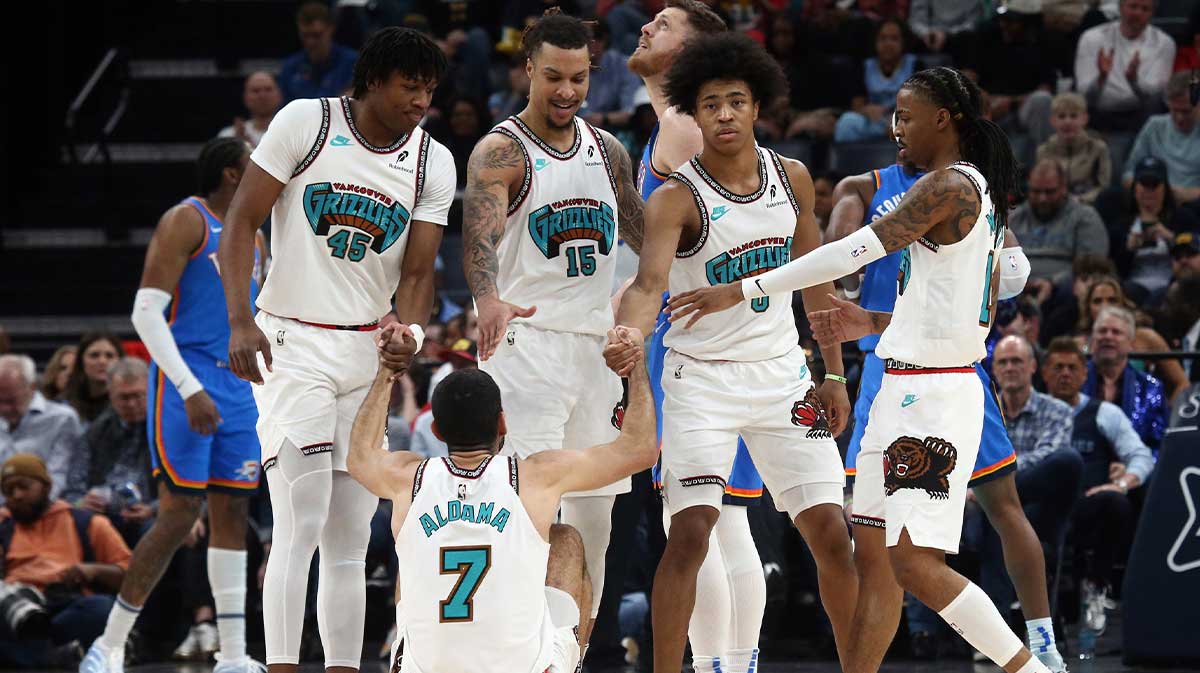 Memphis Grizzlies forward GG Jackson II (45), forward Brandon Clarke (15), forward Jaylen Wells (0) and guard Ja Morant (12) help forward Santi Aldama (7) during the second quarter against the Oklahoma City Thunder at FedExForum.