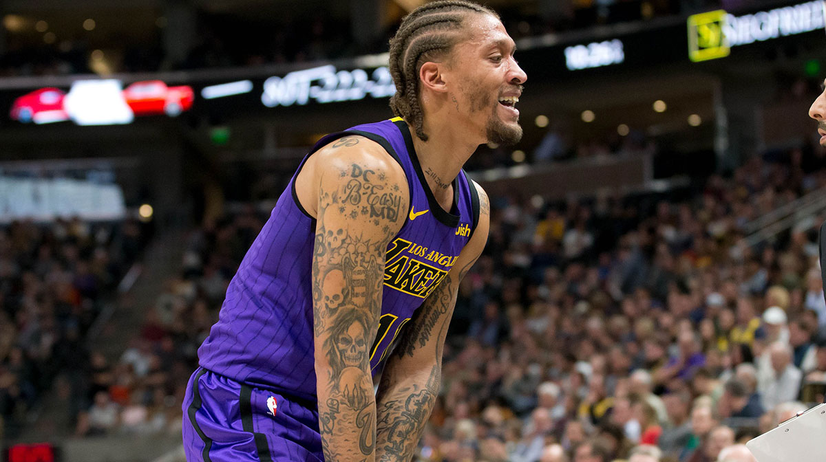 Los Angeles Lakers forward Michael Beasley (11) leaves the court after sustaining an injury during the second half against the Utah Jazz at Vivint Smart Home Arena.