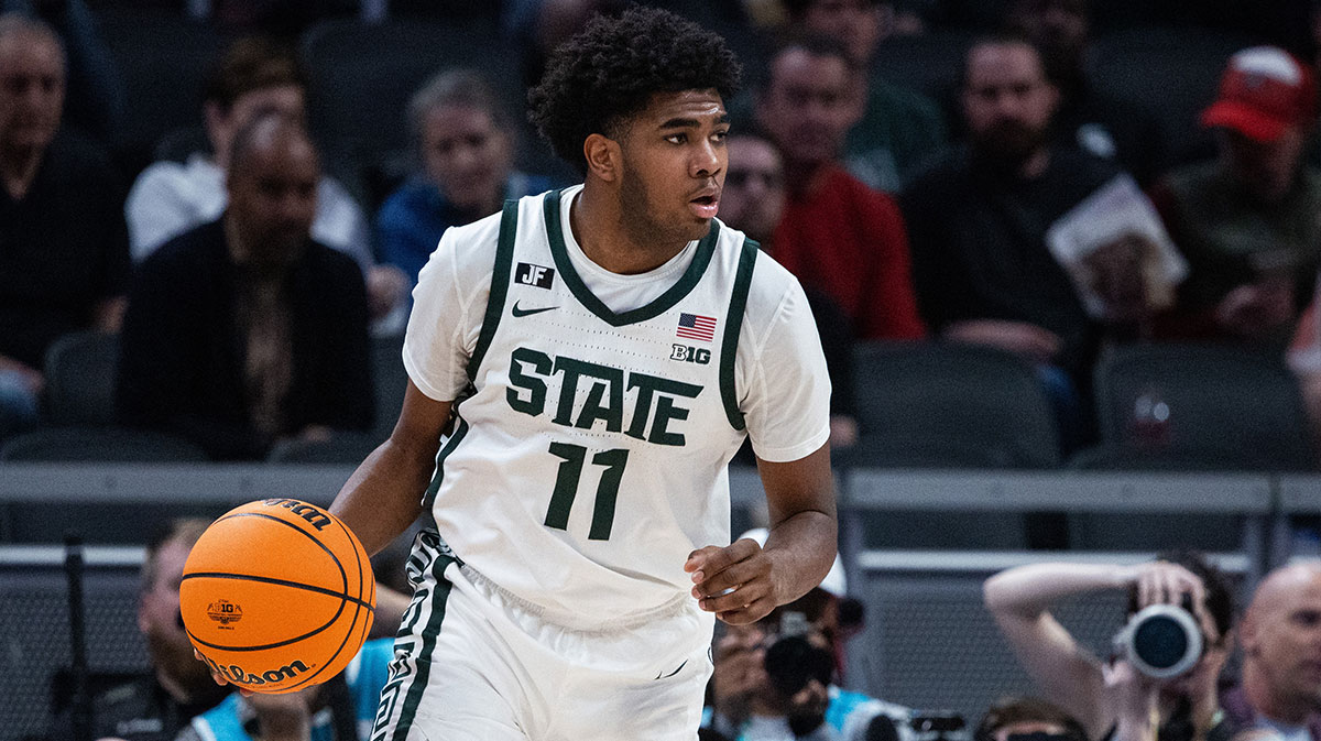 Michigan State Spartans guard Jase Richardson (11) dribbles the ball in the second half against the Oregon Ducks at Gainbridge Fieldhouse.
