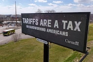 A digital bill board flashes a tariffs message in Kennedy Township, Pa.