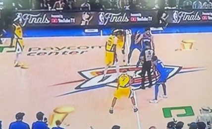 But the trophy suddenly appeared digitally before tipoff