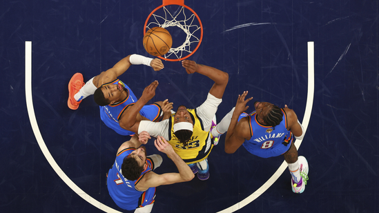 Indiana Pacers center Myles Turner (33) battles Oklahoma City Thunder forward Jalen Williams (8), forward Chet Holmgren (7) and =t for the rebound during the first half of Game 4 of the NBA Finals basketball series.(AP)
