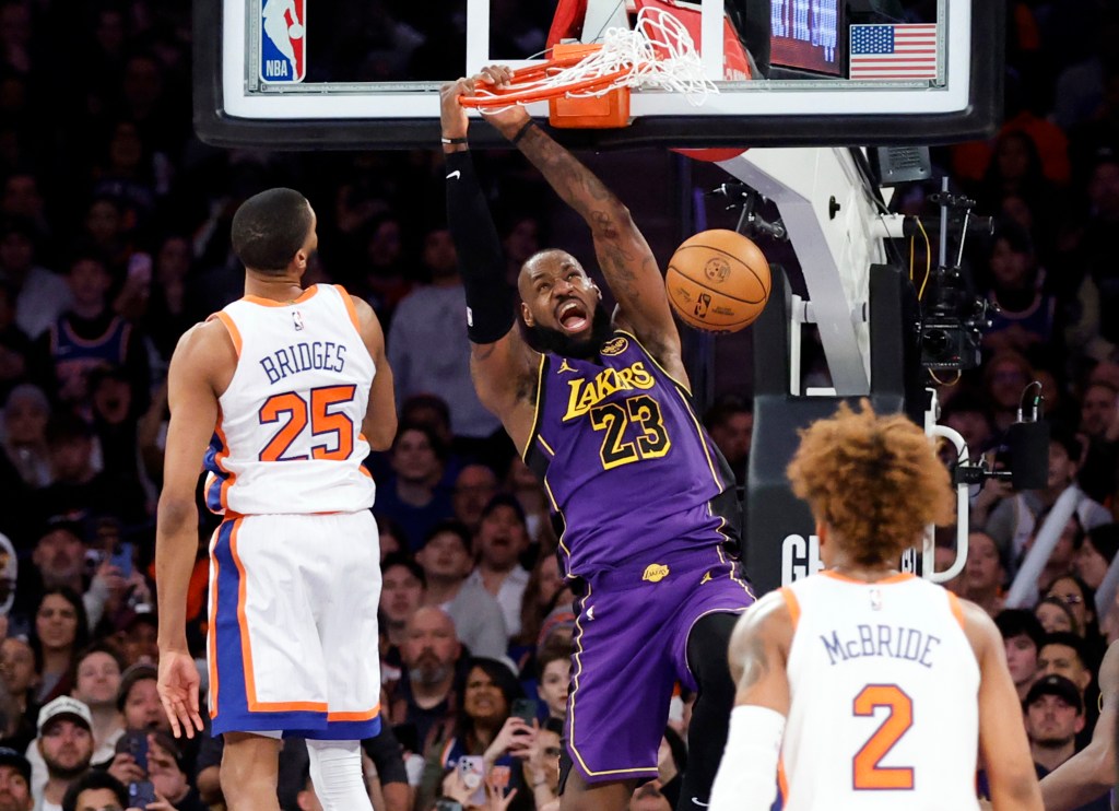 LeBron James dunks against the Knicks this past season.