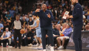 Memphis Grizzlies Head Coach Taylor Jenkins (right) and Interim Golden State Warriors Head Coach Mike Brown (left) lead their teams from the sidelines during game five of the second round for the 2022 NBA playoffs at FedExForum.