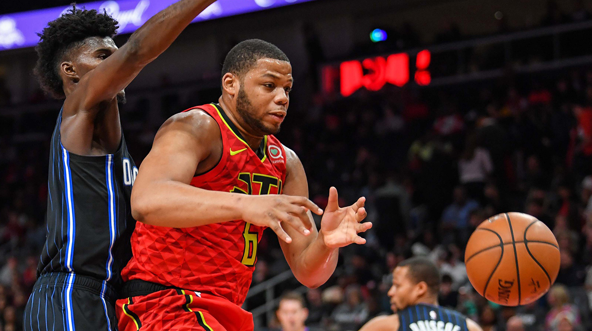 Atlanta Hawks forward Omari Spellman (6) can't control the ball defended by Orlando Magic forward Jonathan Isaac (1) during the second half at State Farm Arena. 