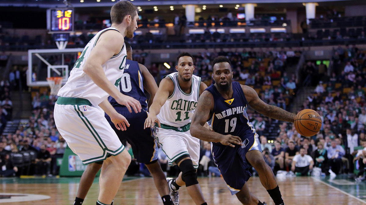 Memphis Grizzlies forward P.J. Hairston (19) drives the ball against Boston Celtics guard Evan Turner (11) in the first half at TD Garden.