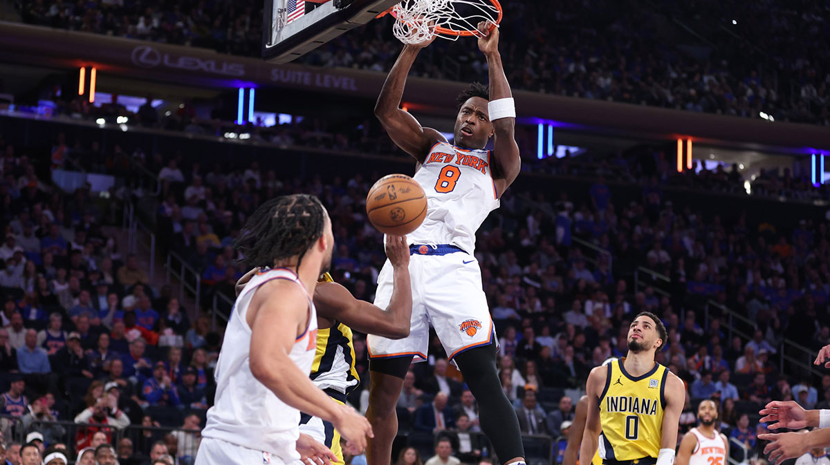 New York Knicks forward OG Anunoby (8) dunks against the Indiana Pacers in the third quarter during game one of the eastern conference finals for the 2025 NBA Playoffs at Madison Square Garden.