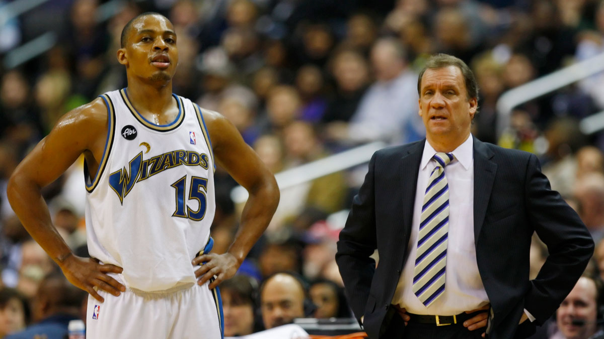 Washington Wizards guard Randy Foye (15) talks with head coach Flip Saunders (right) against the Dallas Mavericks at Verizon Center. The Mavericks won 94-93.